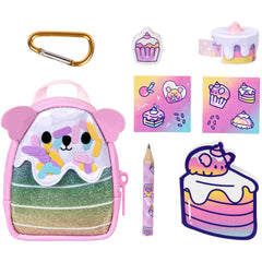 REAL LITTLES Scented mini stationery surprises inside backpack for desk play.