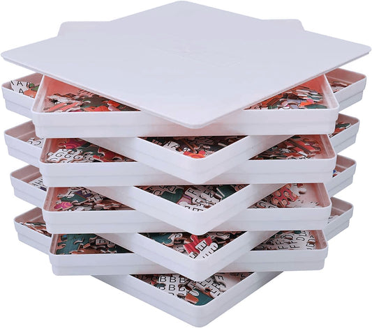 RECHIATO 8x8 sorting trays with lid shown on a table for puzzle organization and easy access.