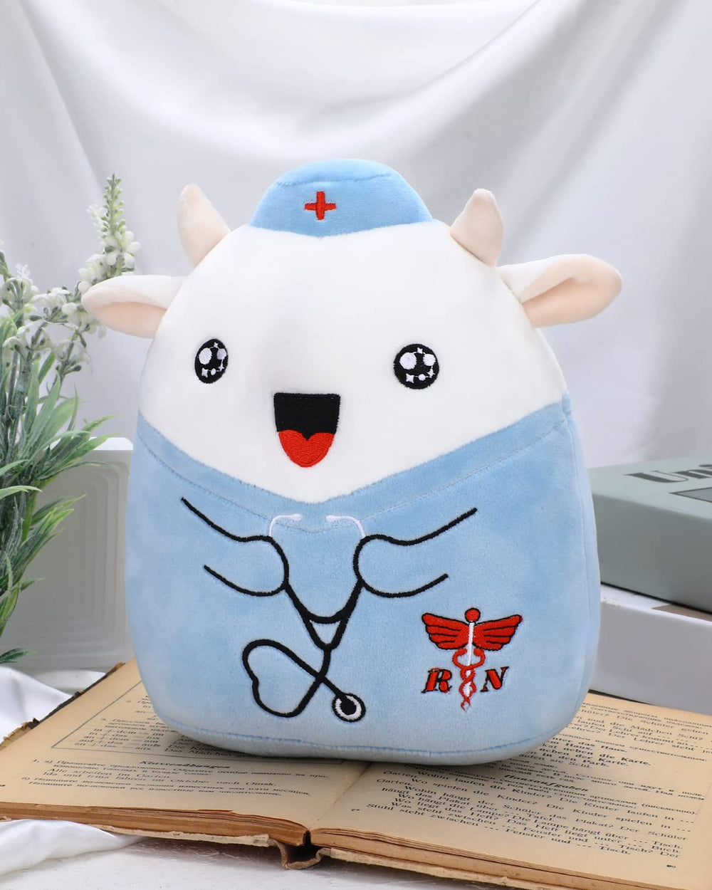 Refavor Nurse Cow plush logo on hat emphasizes nursing theme for gifting.