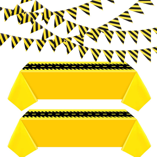 Remagr construction tablecloth 54x108 inch in black and yellow protects tables during parties.