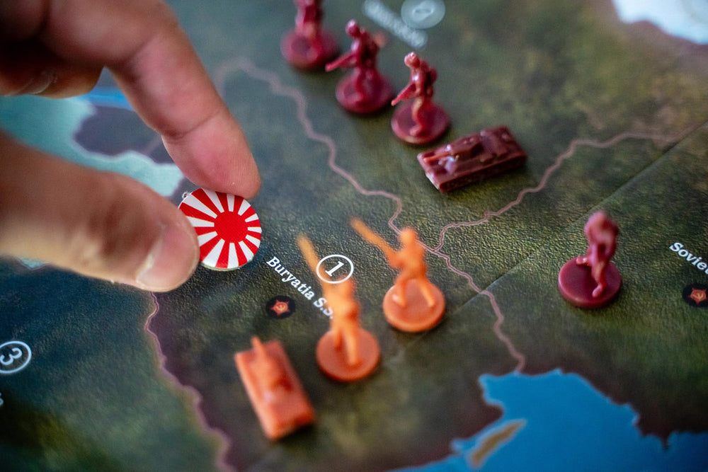Renegade Axis & Allies 1942 dice and counters speed up battles.