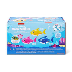 Robo Alive Junior Baby Shark yellow singing while swimming during bath time.