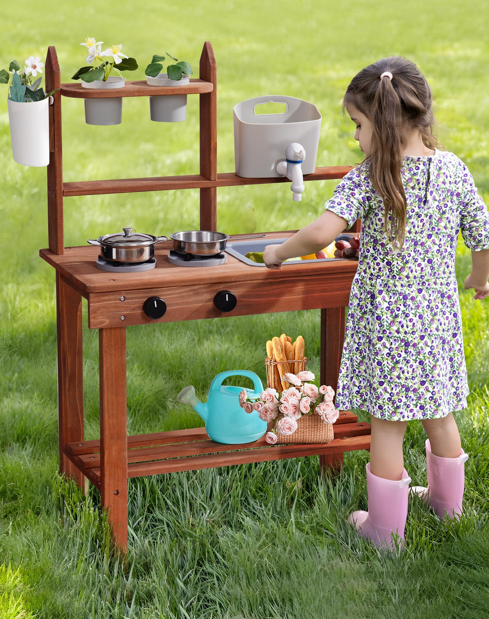 ROBUD Mud Kitchen planters and watering can spark gardening-inspired exploration.