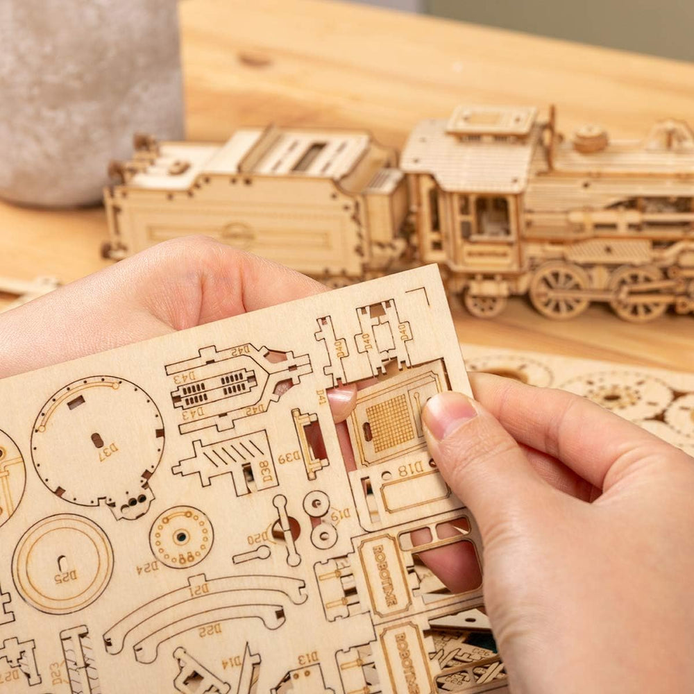 ROKR kit shows no-glue assembly with clear step-by-step instructions.
