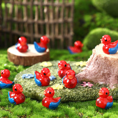 RoundFunny spiderweb duck mini figure on shelf decor, adding whimsy.