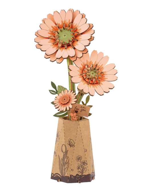 Rowood orange Gerbera Daisy puzzle assembly showing interlocking wooden petals for hands-on crafting.