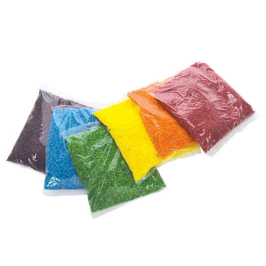 Roylco Sensory Rice in six colors displayed in bowls, encouraging tactile learning