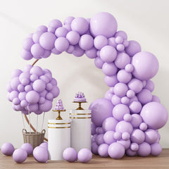 RUBFAC balloon arch kit laid out with pastel purple balloons for a festive backdrop
