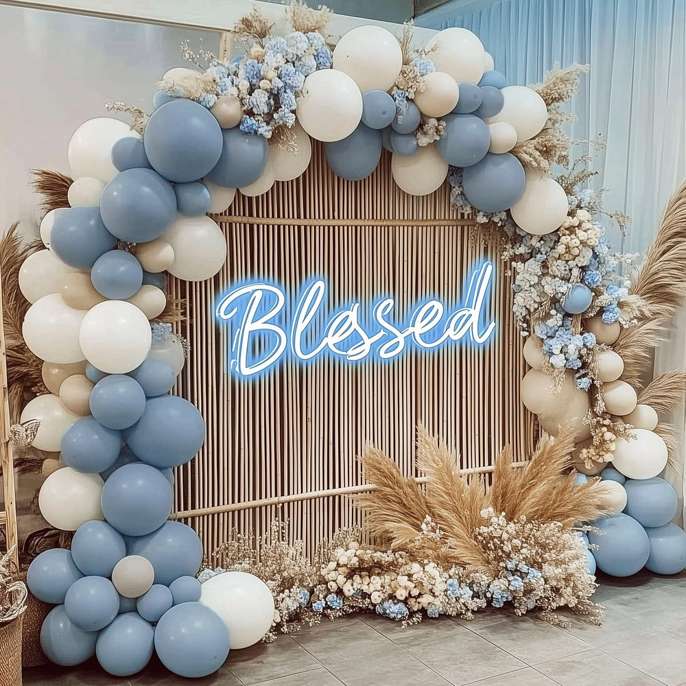 Rubfac balloon garland arch setup shows how haze blue shades brighten venues.