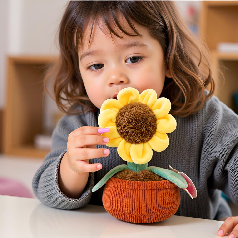 Ryttir flower plush serves as decorative lumbar support at a desk.