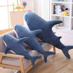 Ryttir ultra-soft velvet shark plush delivers cozy snuggle time.