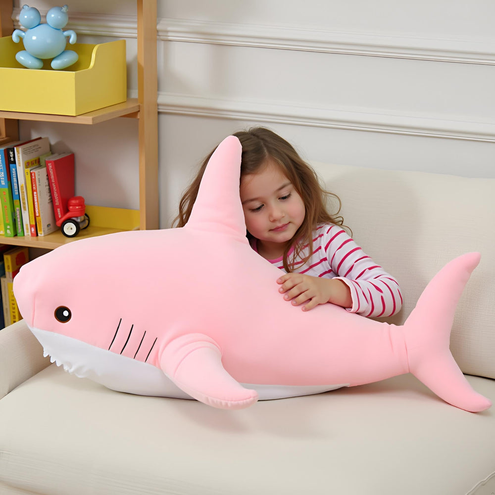 Ryttir shark plush doubles as a supportive lumbar pillow during seating.