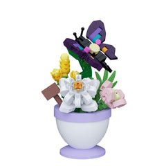 Sacblirr mini flower bonsai with daisy and butterfly adds color to home decor.