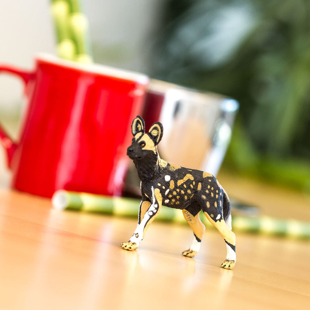 Safari Ltd. African Wild Dog toy size comparison shows 3.5 by 2.75 inches for easy storytelling