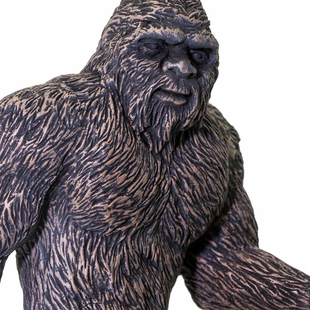 Safari Ltd. Bigfoot figure from Mythical Realms enhances collection display.
