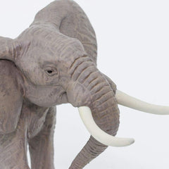 Safari Ltd elephant figurine shown on a shelf for imaginative play.