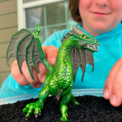 Safari Ltd Forest Dragon figurine detailed scales inviting tactile exploration.