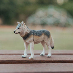 Safari Ltd. Gray Wolf Figurine side profile highlights natural stance for storytelling.