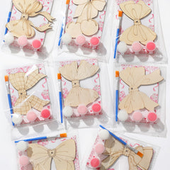 Saypacck pink bow crafts set ready for coloring and decorating party favors.