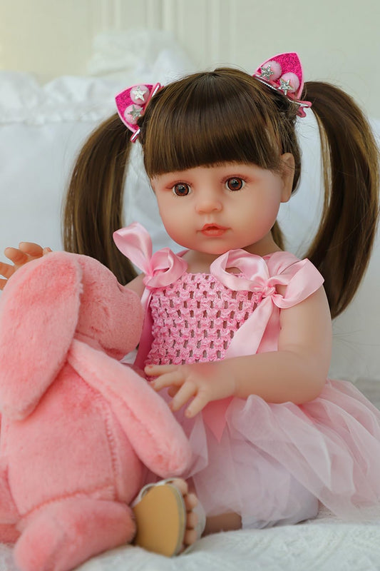 SCOM lifelike reborn doll girl face for imaginative play.