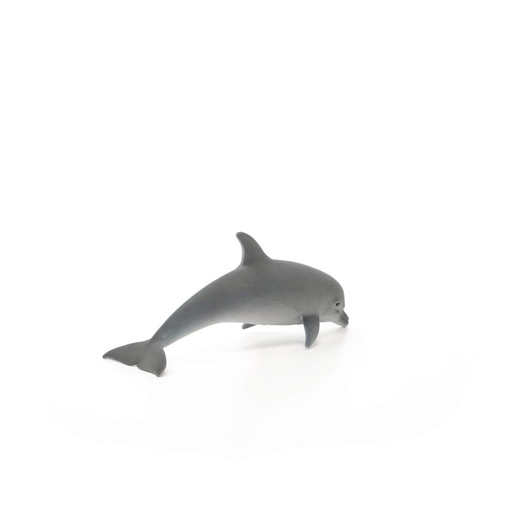Schleich Dolphin figure in action pose supports storytelling adventures.