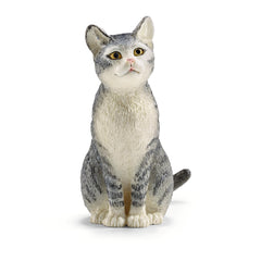 Schleich Farm World gray and white cat figurine sitting for imaginative play.