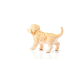Schleich detailed puppy figurine supports open-ended pretend play.