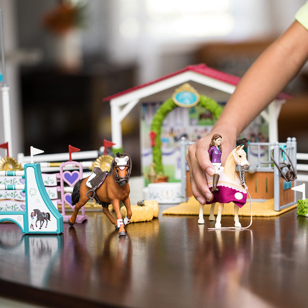 Schleich horse jumps and straw bales inspire dynamic show jumping scenarios.