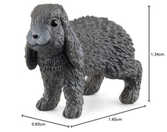Schleich lop-eared bunny on green grass invites gentle farm adventures.