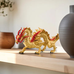 Schleich dragon figure features fiery red spines and textured surface for lifelike presence.