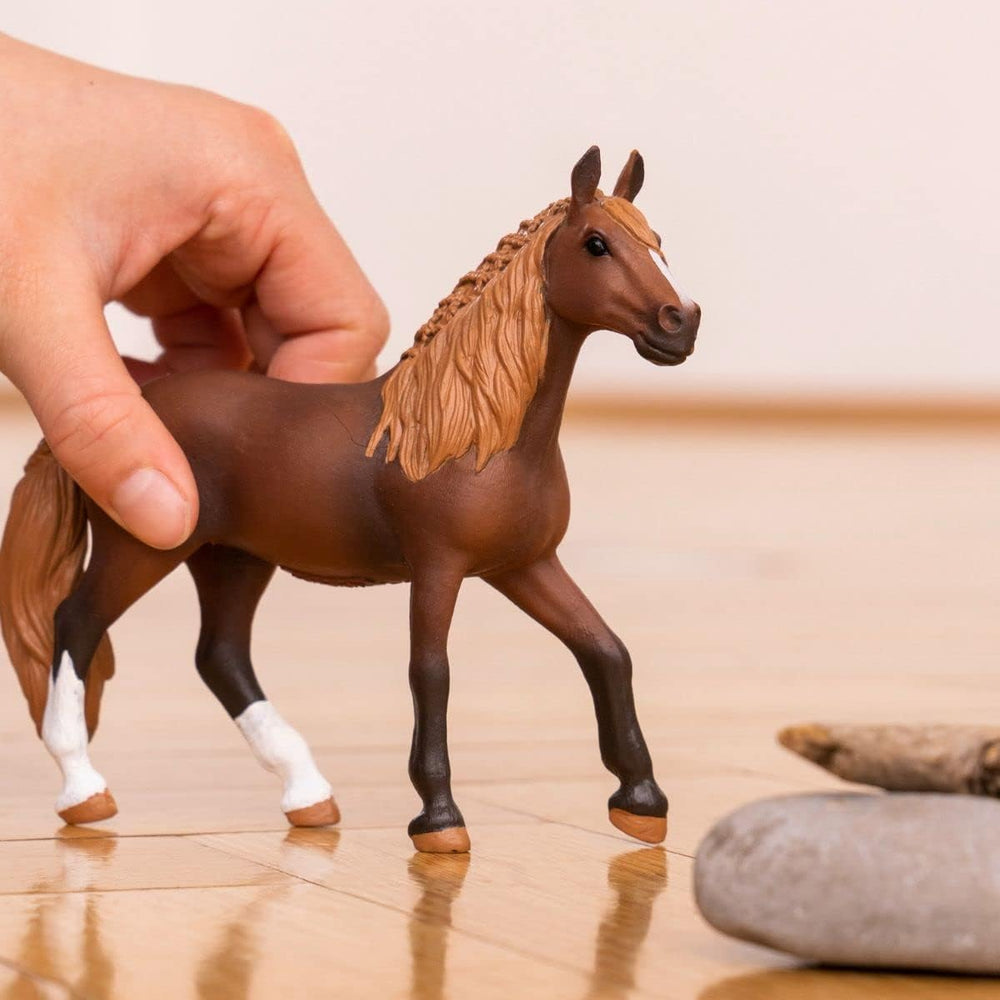 Schleich Peruvian Paso mare with flowing tail enhances storytelling and imagination.