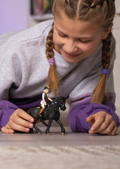 Schleich saddle-on Princess demonstrates riding gear for realistic role play.