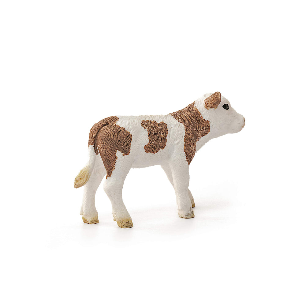 Close-up of Schleich Simmental Calf figurine showing detailed features.
