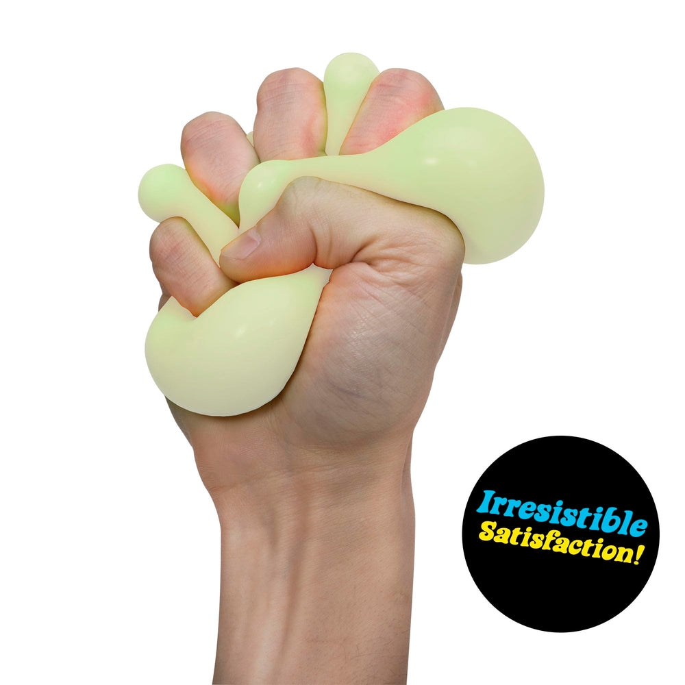 NeeDoh glow-dark in hand, ideal for portable sensory breaks.