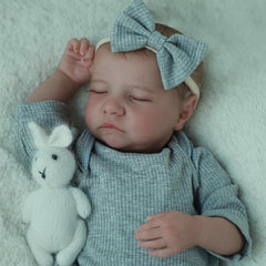 SCOM 18in Levi wearing grey clothing with pacifier and bottle