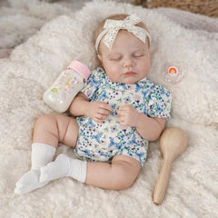 SCOM 20-inch reborn doll face detail highlights lifelike coloring for photography.