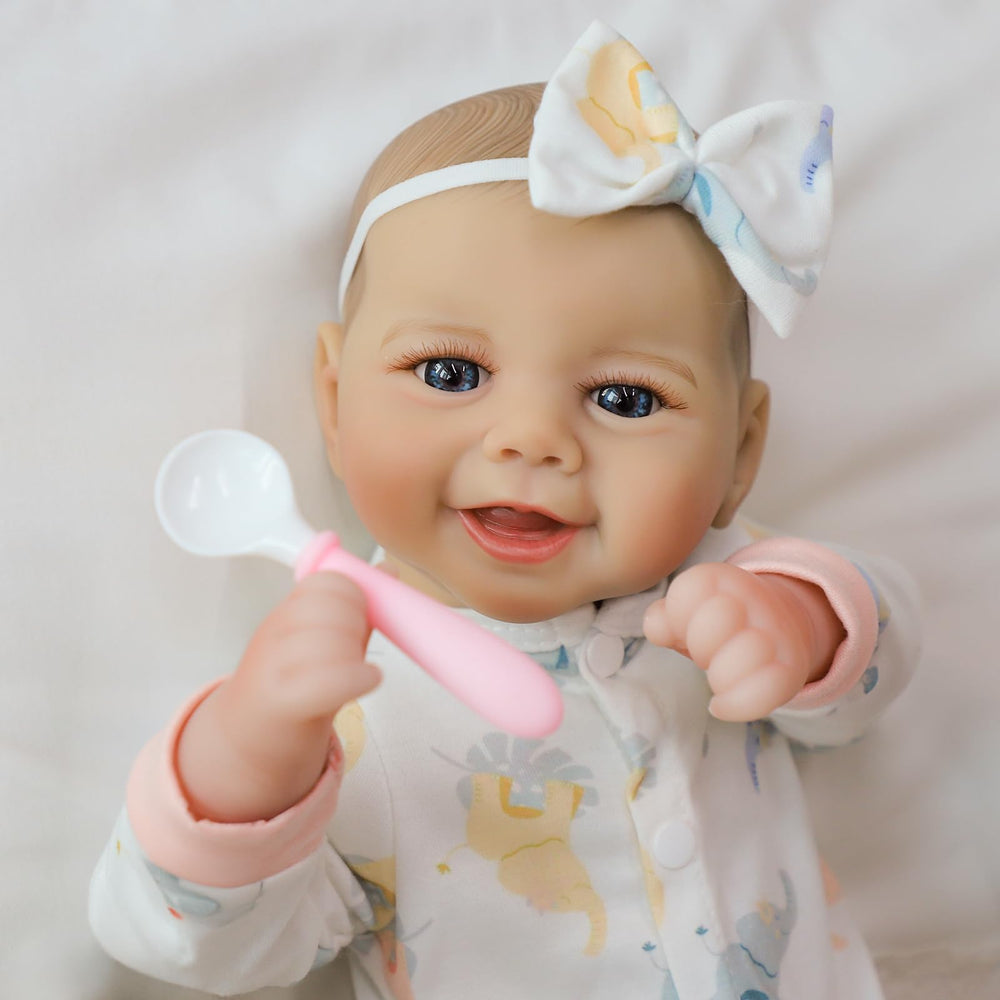 SCOM Baby Doll paint-on hair for a natural, tangle-free touch.