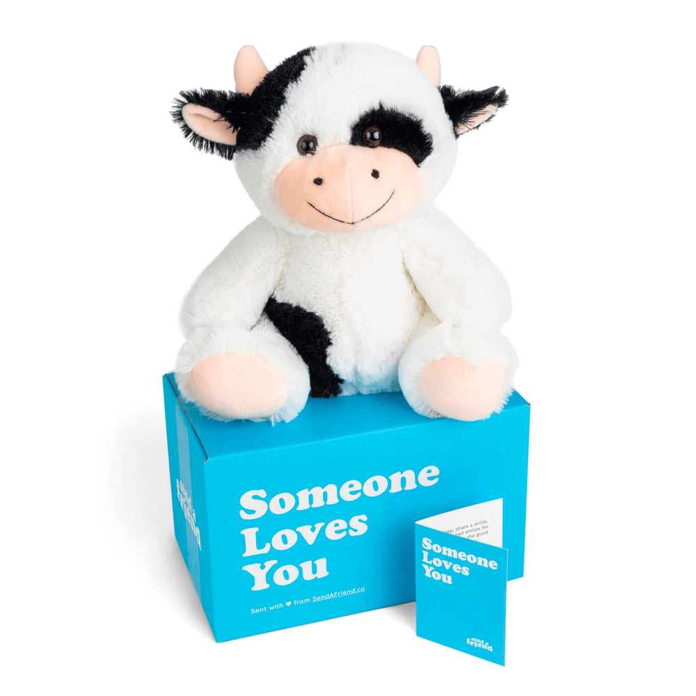 SendAFriend Cooper the Cow plush in a gift-ready box for faraway hugs.