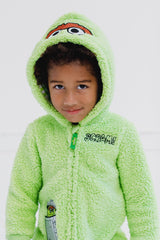 Sesame Street Oscar pocket detail keeps small treasures handy.