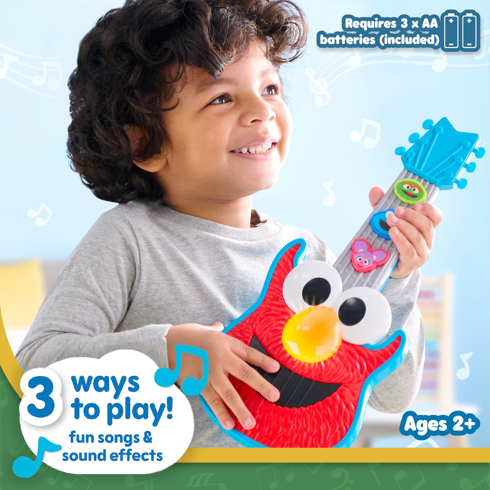 Elmo guitar toy, side view, buttons activate sounds and fun.