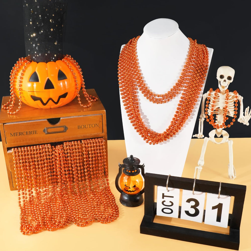 SHAOQINLIN Mardi Gras orange beads decor arranged for celebrations.