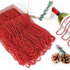 SHAOQINLIN red bead necklace close-up highlights glossy finish and lightweight wear