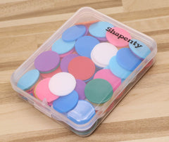 Shapenty colorful tokens suitable for classroom games and family play.