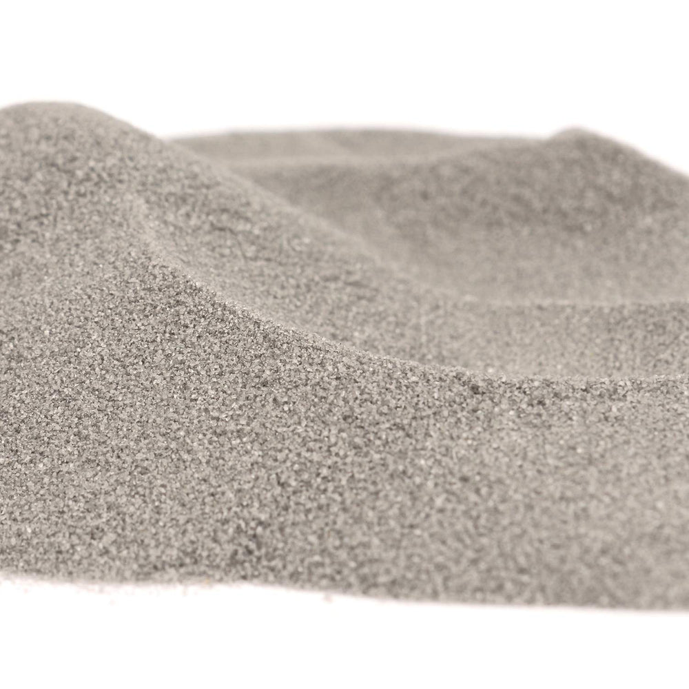 Shiny Stone terrarium-ready sand adds color without fading for lush plant displays.