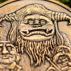 Shire Post Mint Labyrinth token sits well on a desk or shelf.