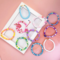SIELEVIN colorful beach-style bracelets complete a summer look