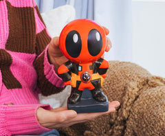 Silver Buffalo Deadpool Chibi Stance with coin-stacking demonstration.