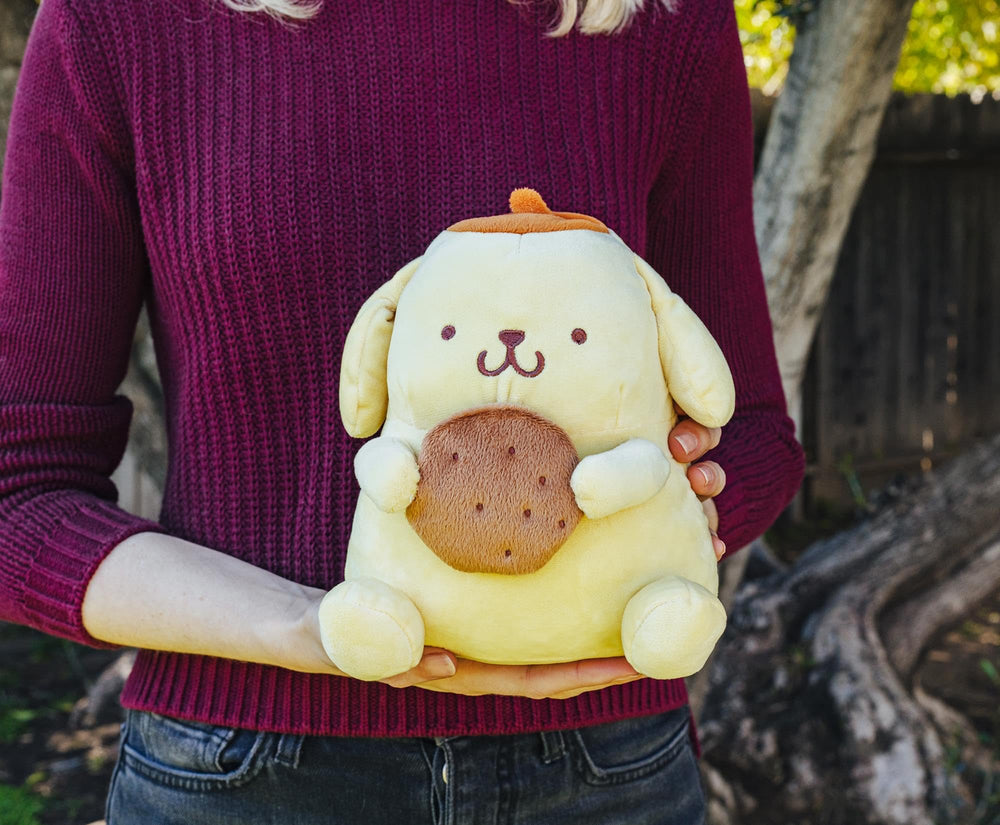 Silver Buffalo Pompompurin plush money bank eases coin storage for organization.