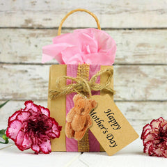Skylety bear toy serves as a playful party favor at weddings and birthdays.