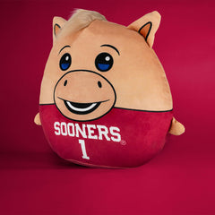Sleep Squad Boomer 12in plush on couch, ideal evening snuggle partner
